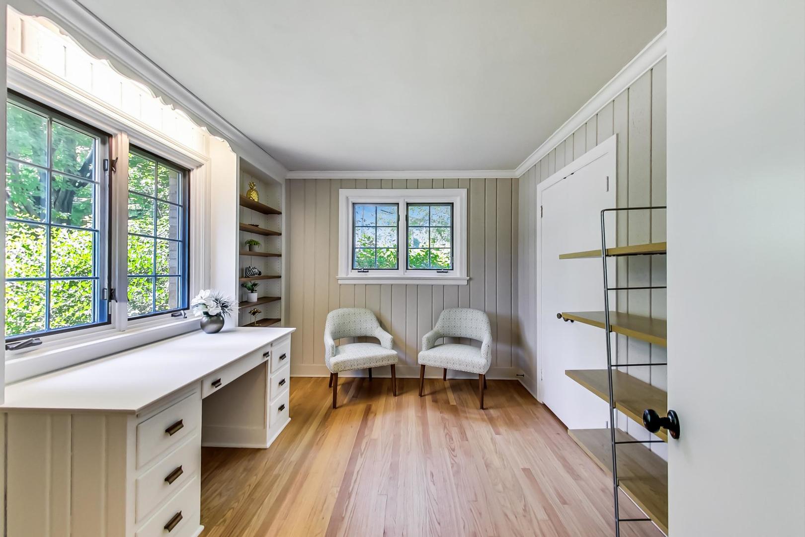 504 Illinois Road Wilmette, IL 60091 - Photo 17 of 43 a view of a livingroom with furniture and a window