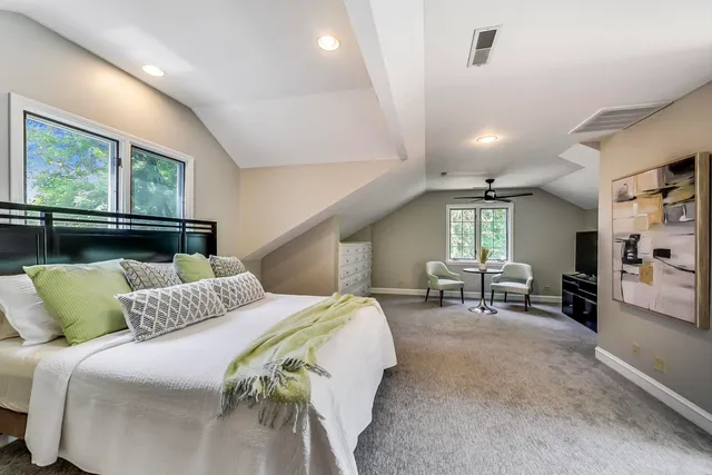 a bedroom with a bed and furniture