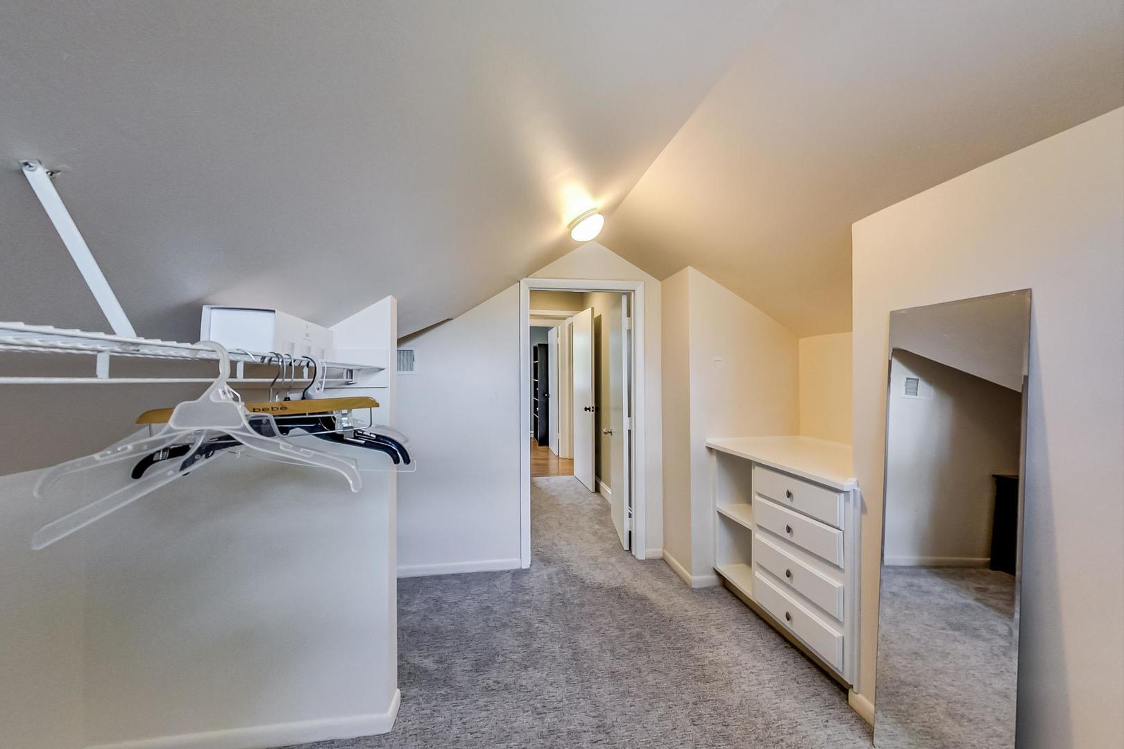 504 Illinois Road Wilmette, IL 60091 - Photo 22 of 43 a view of a livingroom with furniture