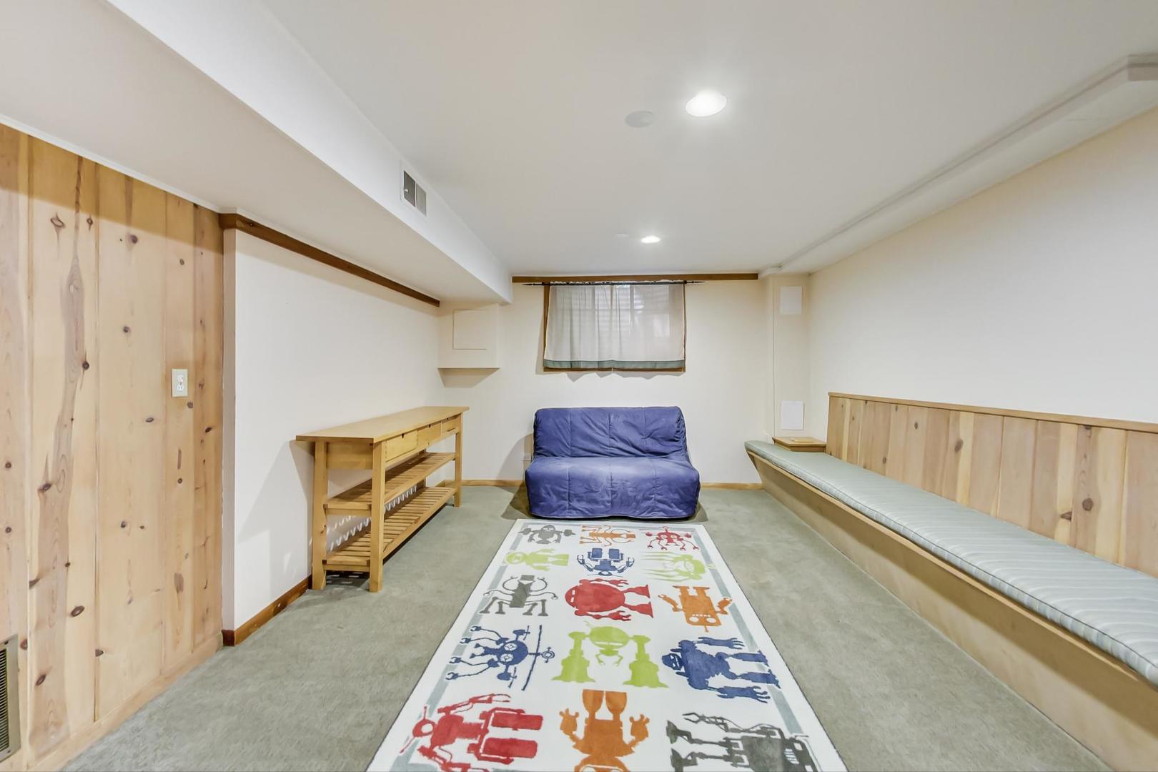 504 Illinois Road Wilmette, IL 60091 - Photo 36 of 43 a large bathroom with a tub and shower