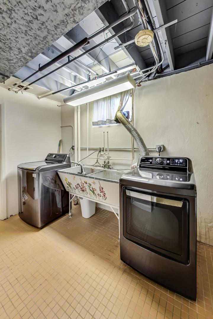 504 Illinois Road Wilmette, IL 60091 - Photo 37 of 43 a kitchen with a stove and a microwave