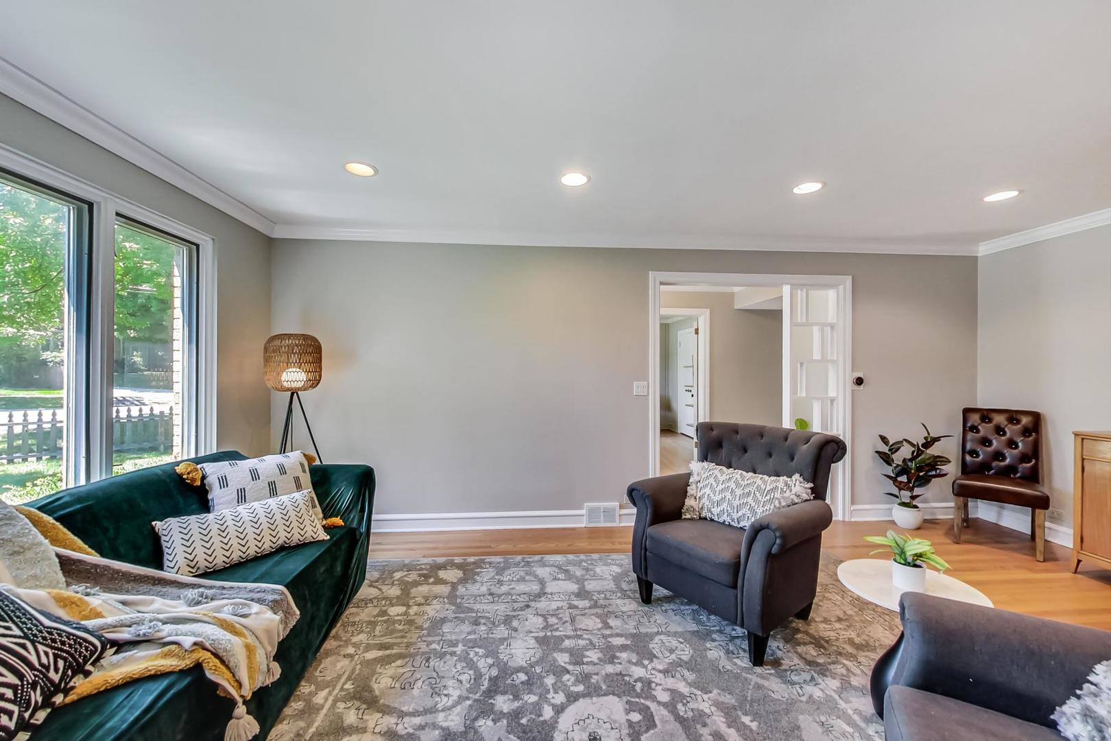 504 Illinois Road Wilmette, IL 60091 - Photo 4 of 43 a living room with furniture and a window