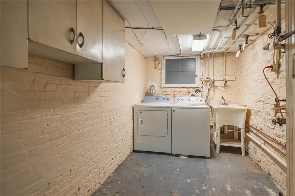 231 Monitor Street Brooklyn, NY 11222 - Photo 19 of 37 a utility room with washer and dryer