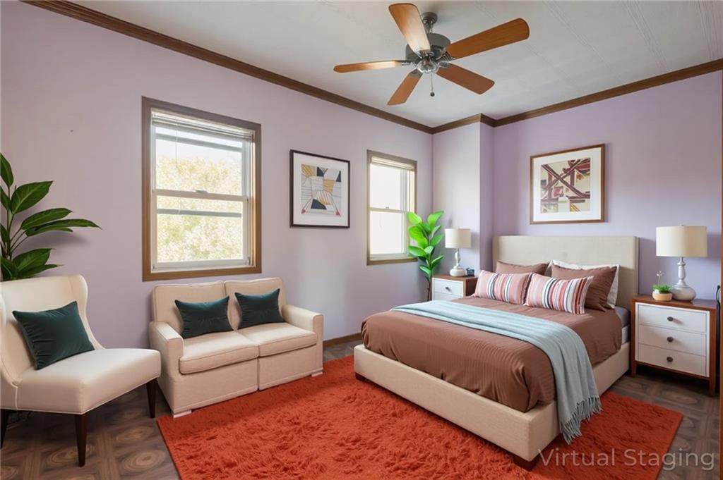 231 Monitor Street Brooklyn, NY 11222 - Photo 33 of 37 a bedroom with a bed a couch and a window