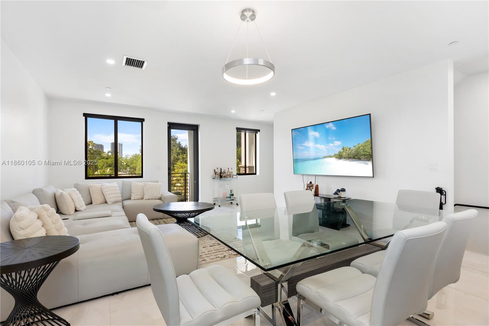 436 Southeast 12th Court Fort Lauderdale, FL 33316 - Photo 2 of 34 a living room with furniture and a window