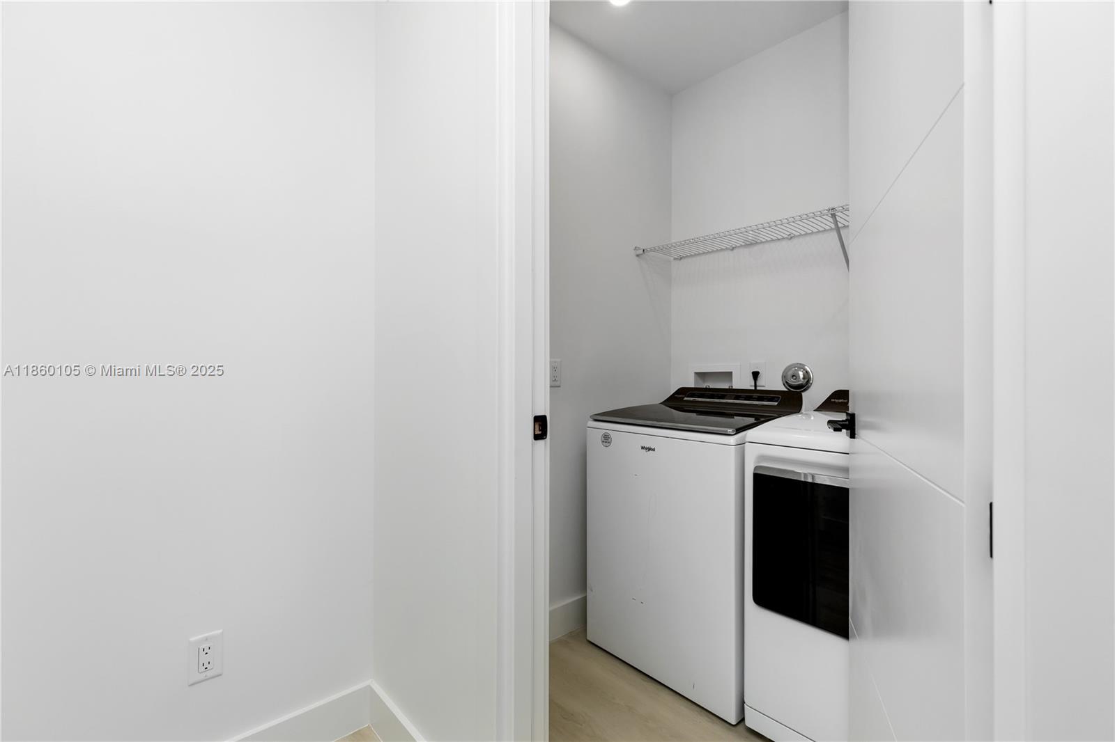 436 Southeast 12th Court Fort Lauderdale, FL 33316 - Photo 21 of 34 a view of a storage and utility room with washer and dryer