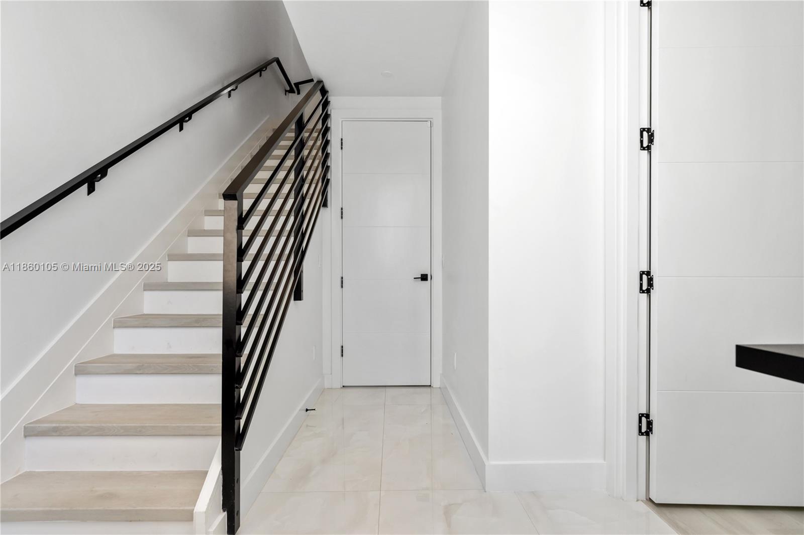 436 Southeast 12th Court Fort Lauderdale, FL 33316 - Photo 22 of 34 a view of staircase with white walls