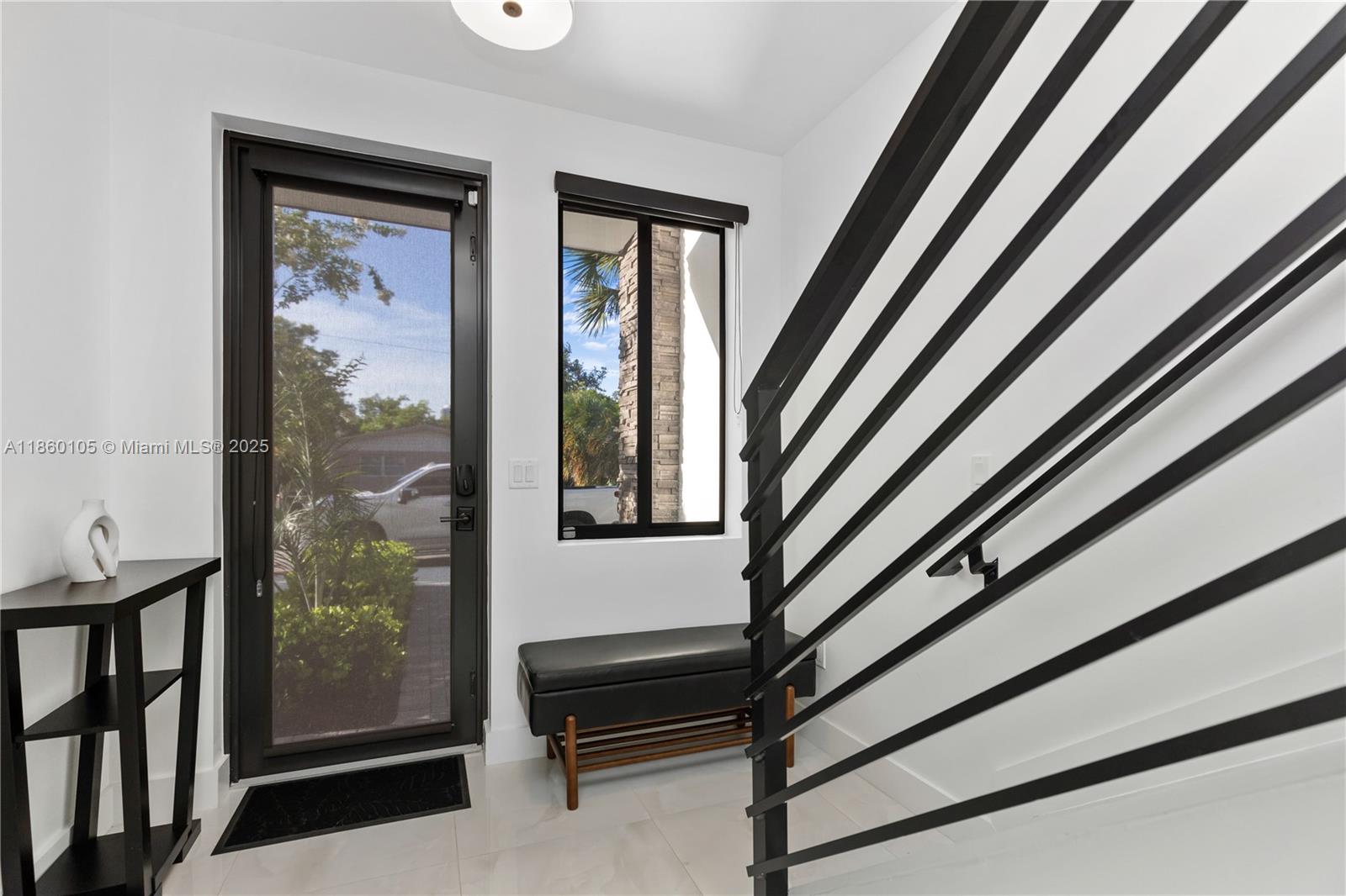 436 Southeast 12th Court Fort Lauderdale, FL 33316 - Photo 23 of 34 a view of a staircase and a living room