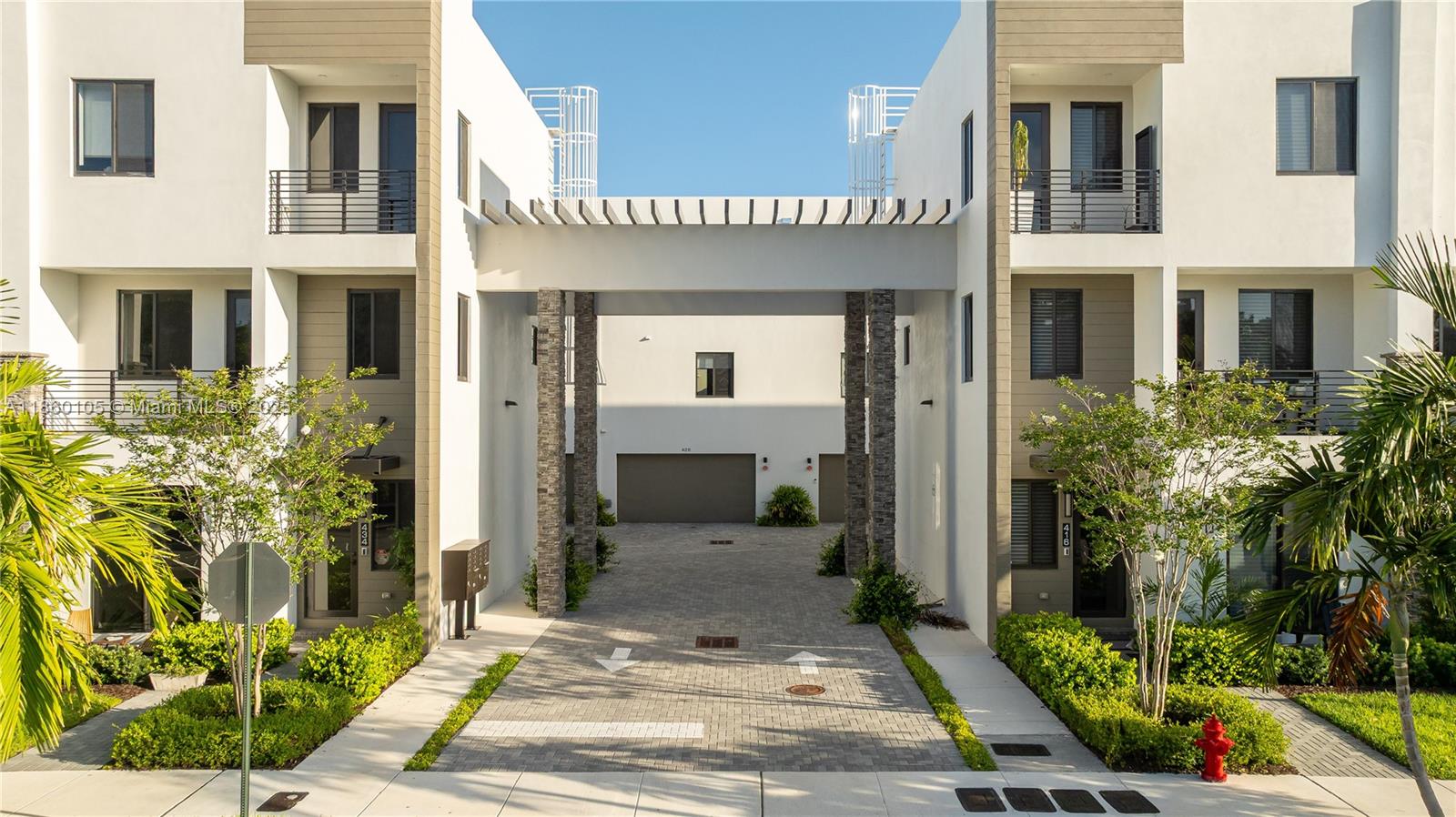 436 Southeast 12th Court Fort Lauderdale, FL 33316 - Photo 24 of 34 a view of a building with potted plants