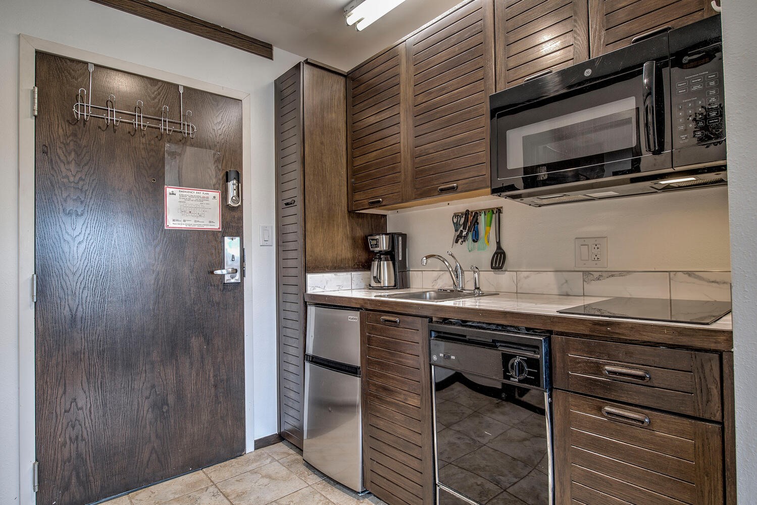 1211 West Keystone Road, Unit 2738 Keystone, CO 80435 - Photo 11 of 31 a kitchen with stainless steel appliances a sink and cabinets