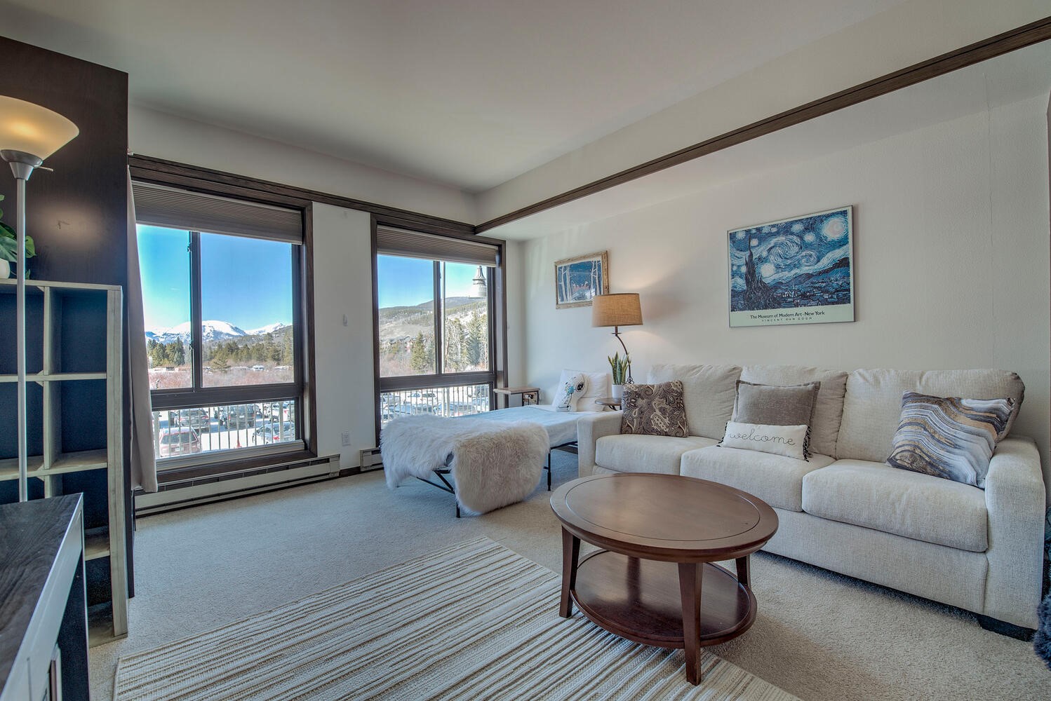 1211 West Keystone Road, Unit 2738 Keystone, CO 80435 - Photo 4 of 31 a living room with furniture and a floor to ceiling window