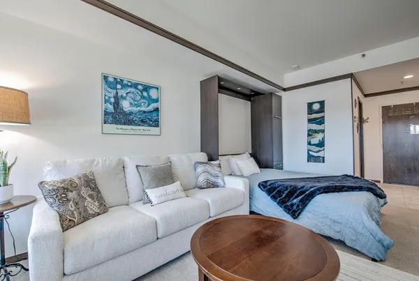 a living room with furniture and a couch