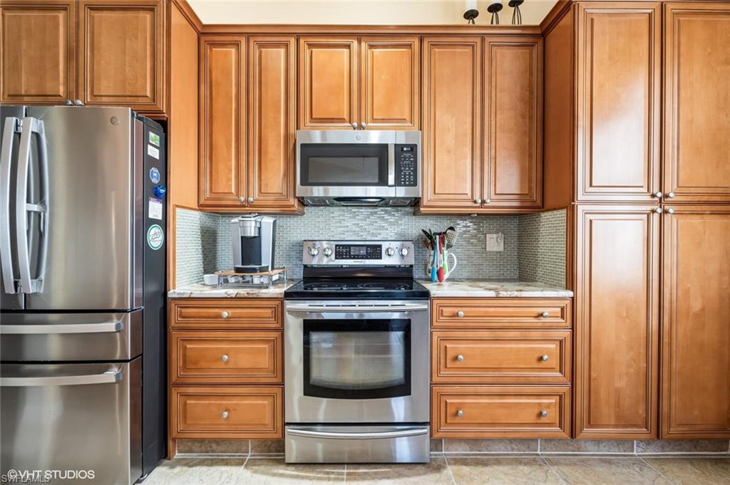 9386 Springview Loop Estero, FL 33928 - Photo 10 of 49 STAINLESS STEEL APPLIANCES