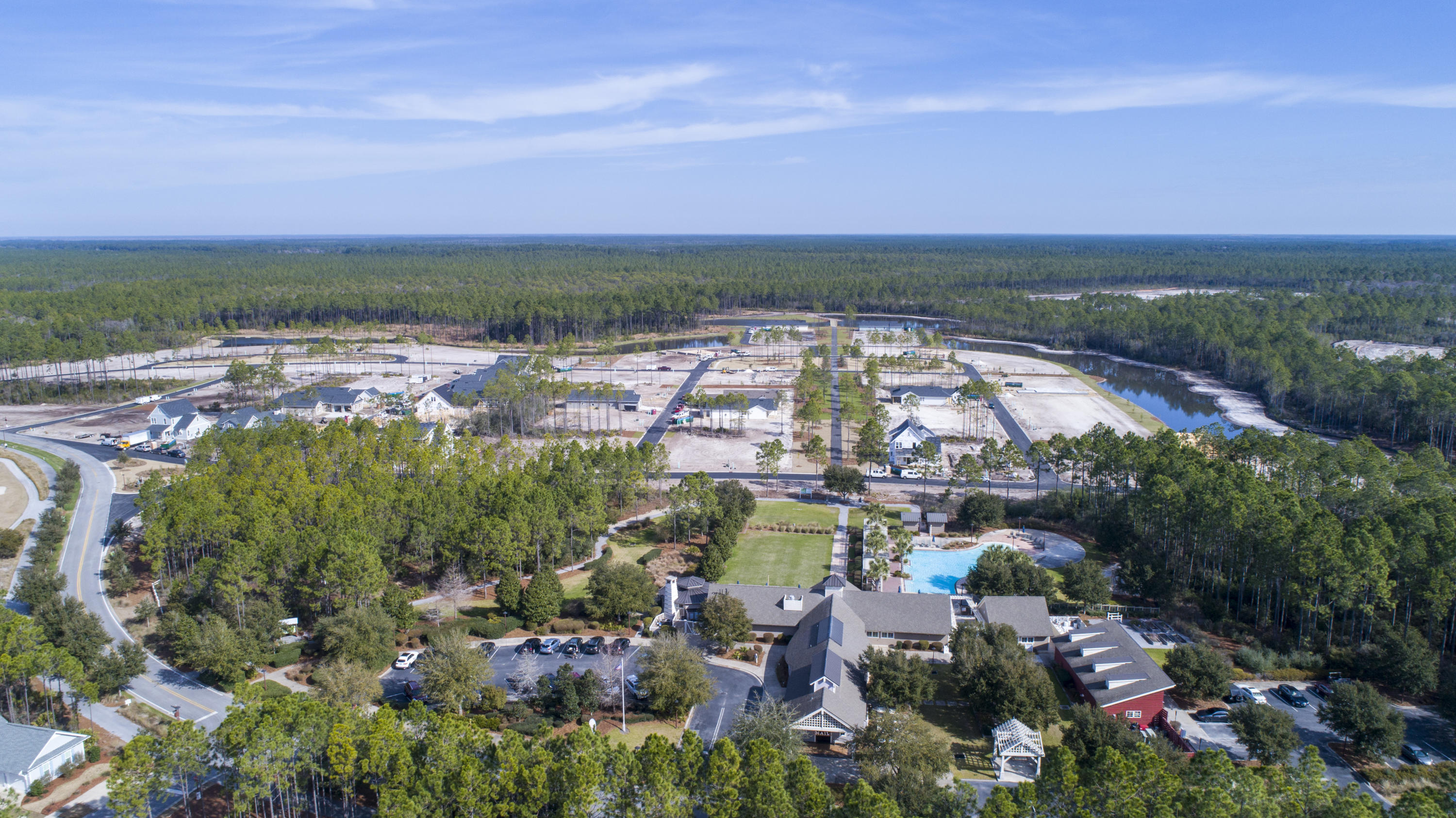 355 Pathways Drive, Unit LOT 90 Watersound, FL 32461 - Photo 10 of 24 a view of a lake with a city view