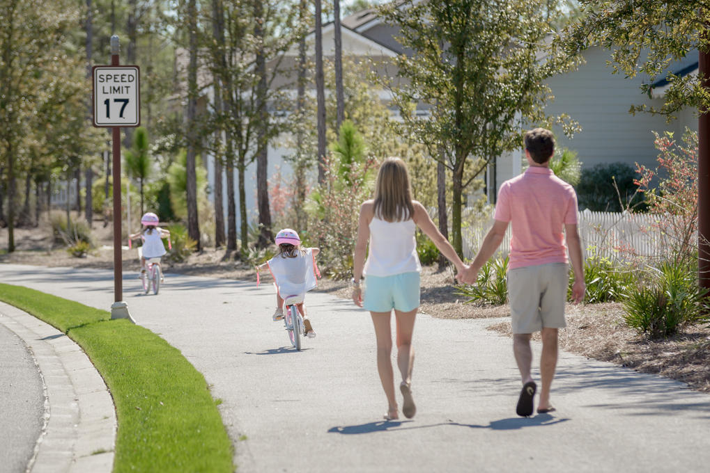 355 Pathways Drive, Unit LOT 90 Watersound, FL 32461 - Photo 13 of 24 a childrens park with lots of swings and slides