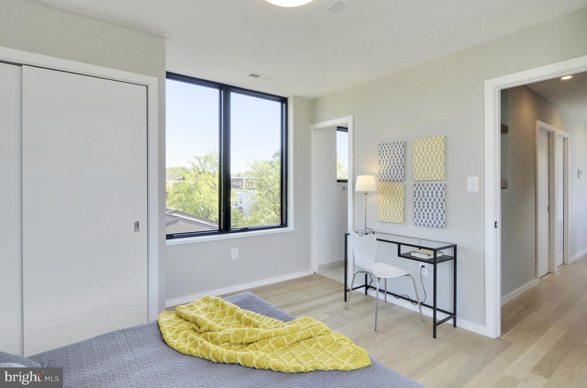 706 16th Street Northeast, Unit 2 Washington, DC 20002 - Photo 14 of 26 a view of a livingroom with furniture and window