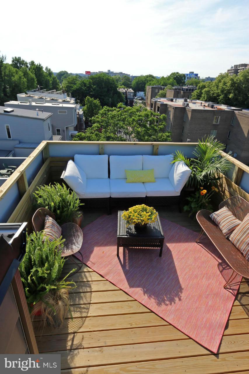 706 16th Street Northeast, Unit 2 Washington, DC 20002 - Photo 21 of 26 a view of a swimming pool with a patio