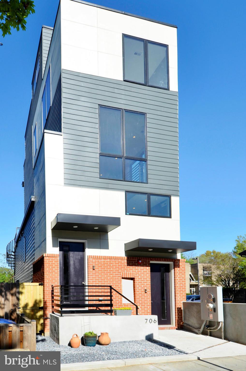 706 16th Street Northeast, Unit 2 Washington, DC 20002 - Photo 24 of 26 a view of a building with many windows