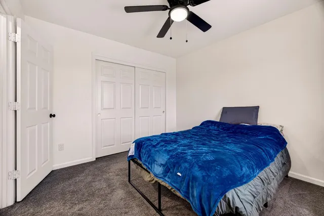 a bathroom with a sink a mirror and a shower