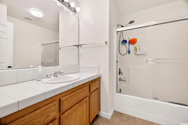 a bathroom with a sink double vanity