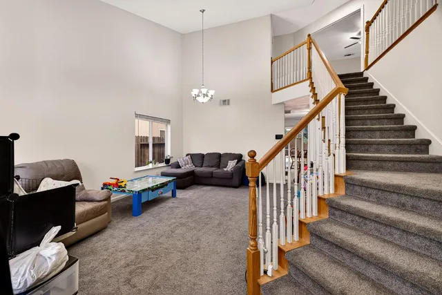 a living room with furniture or stairs and a couch