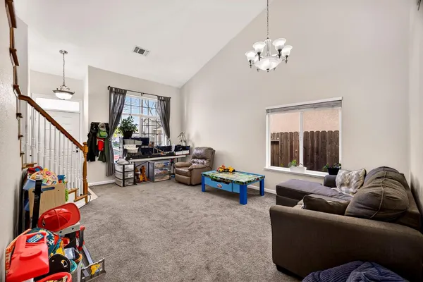 a view of entryway and hall with dining room