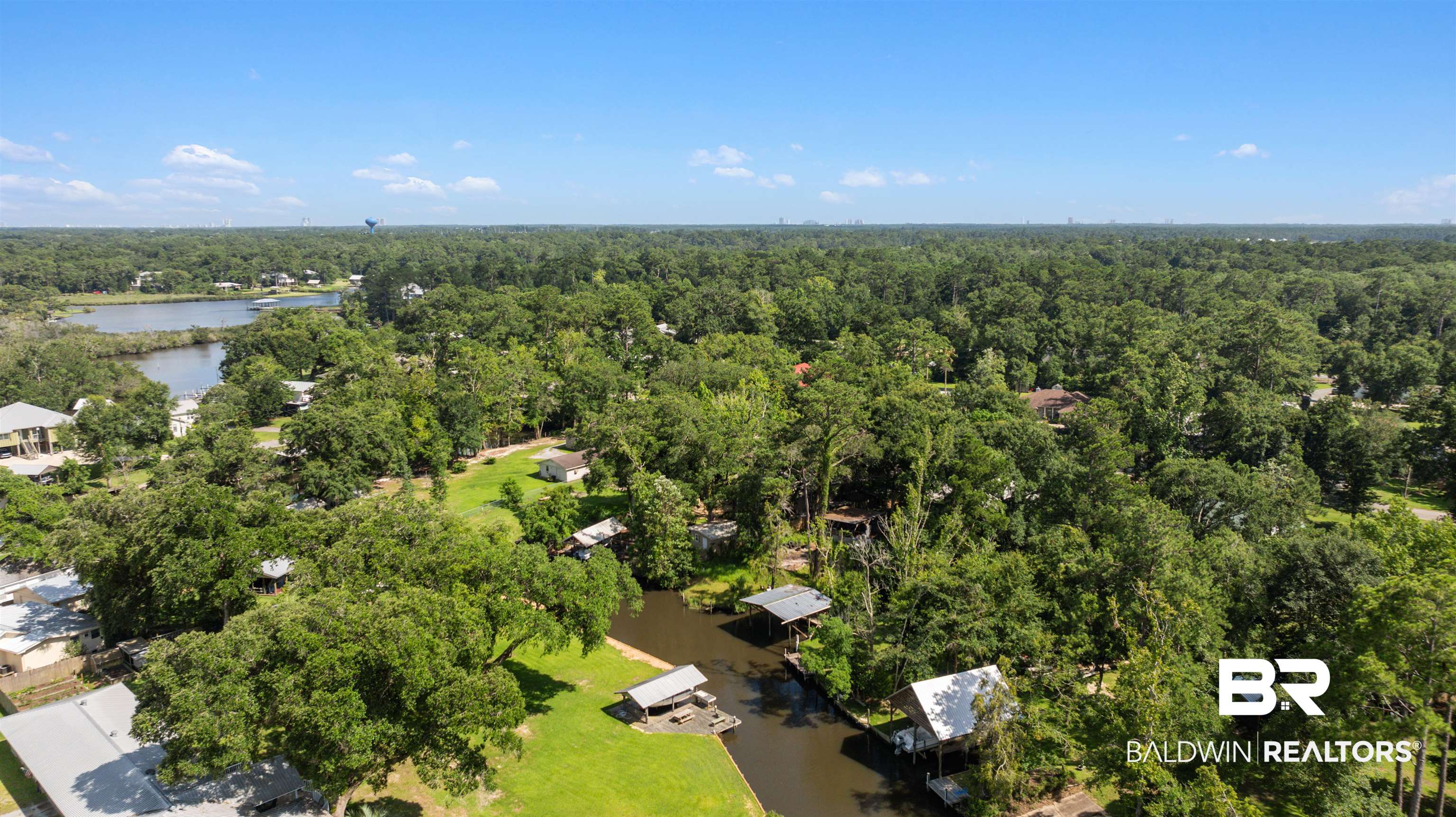 7266 Franklin Road Foley, AL 36535 - Photo 8 of 64 Expansive aerial showcasing a residential area amidst abundant mature trees