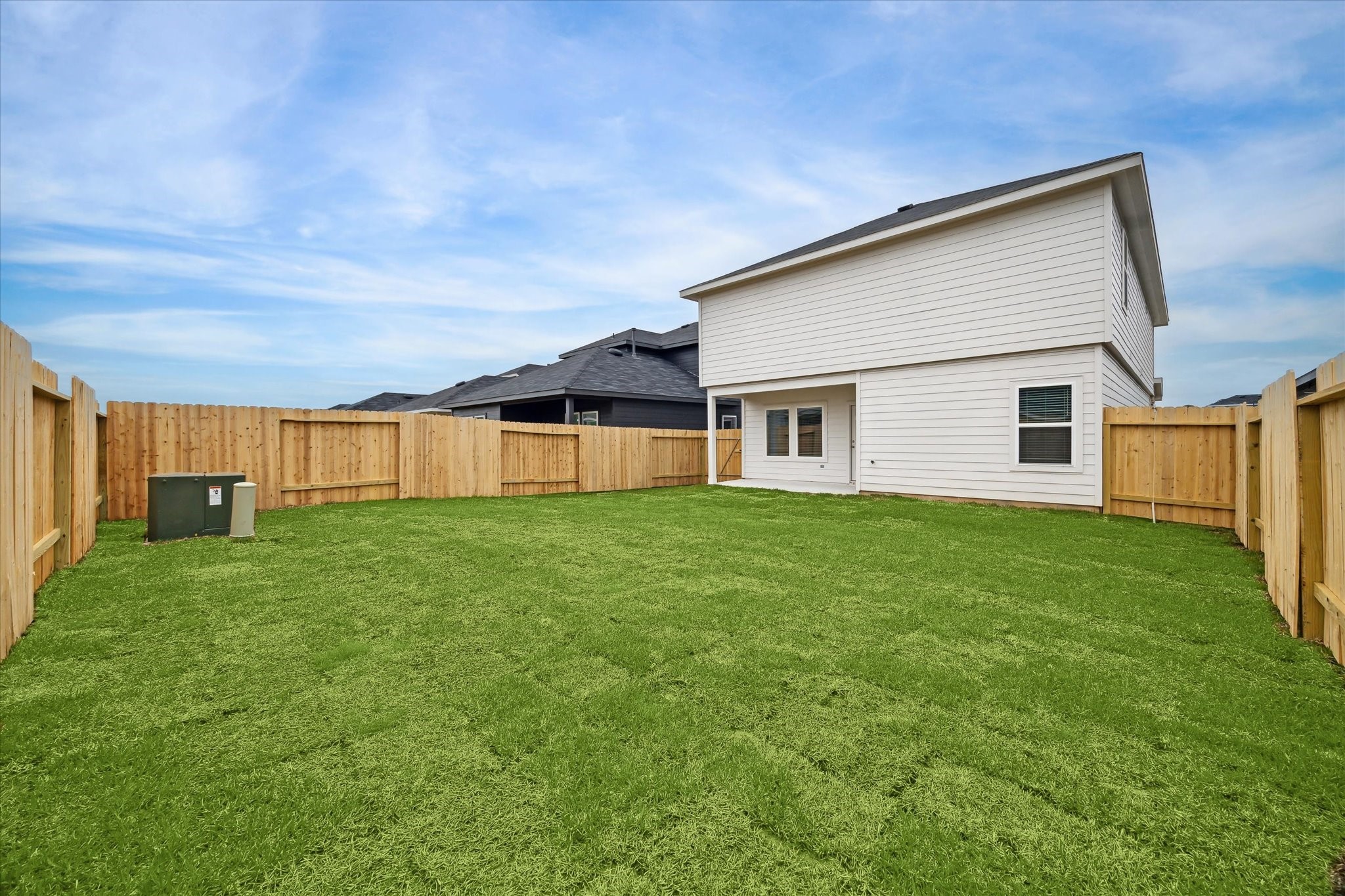 1002 Concord Pointe Lane Houston, TX 77090 - Photo 10 of 10 a view of a house with a backyard