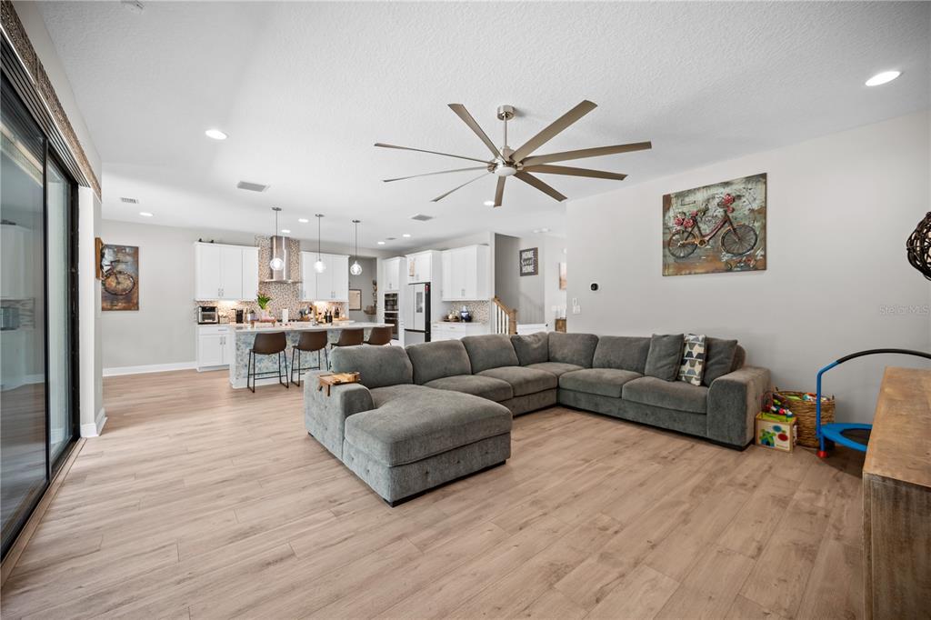 14734 Horse Trot Road Lithia, FL 33547 - Photo 18 of 66 a living room with furniture and a view of kitchen