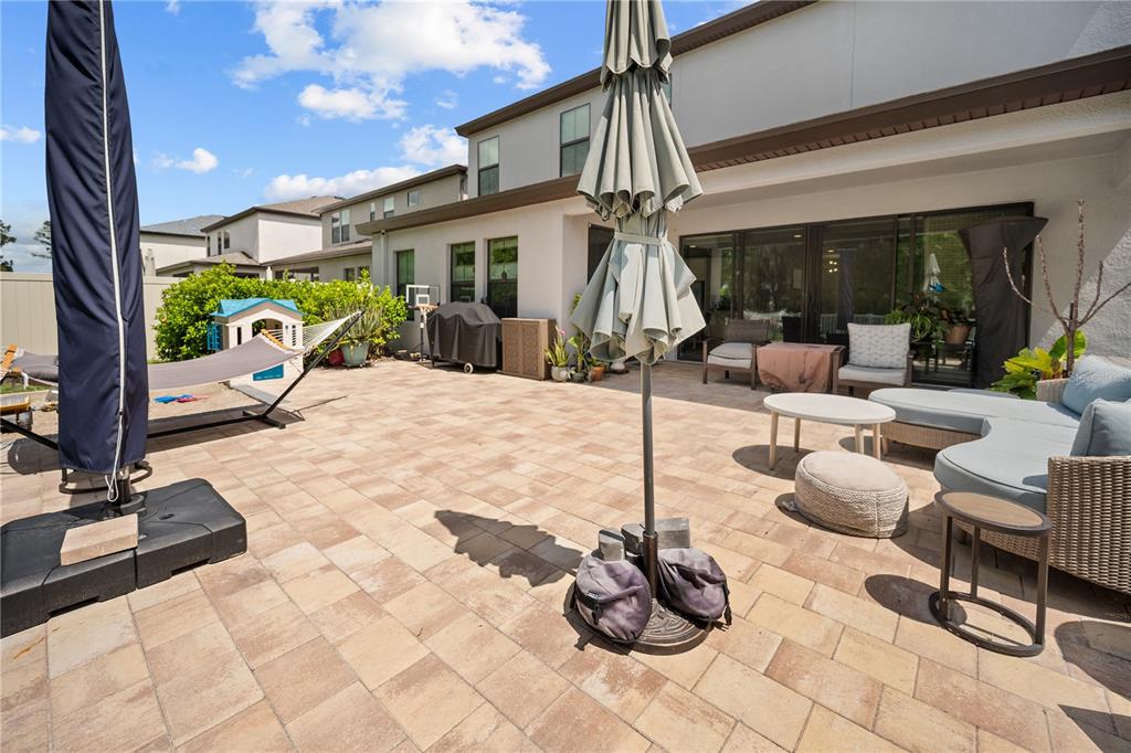 14734 Horse Trot Road Lithia, FL 33547 - Photo 31 of 66 a view of a patio with a table and chairs