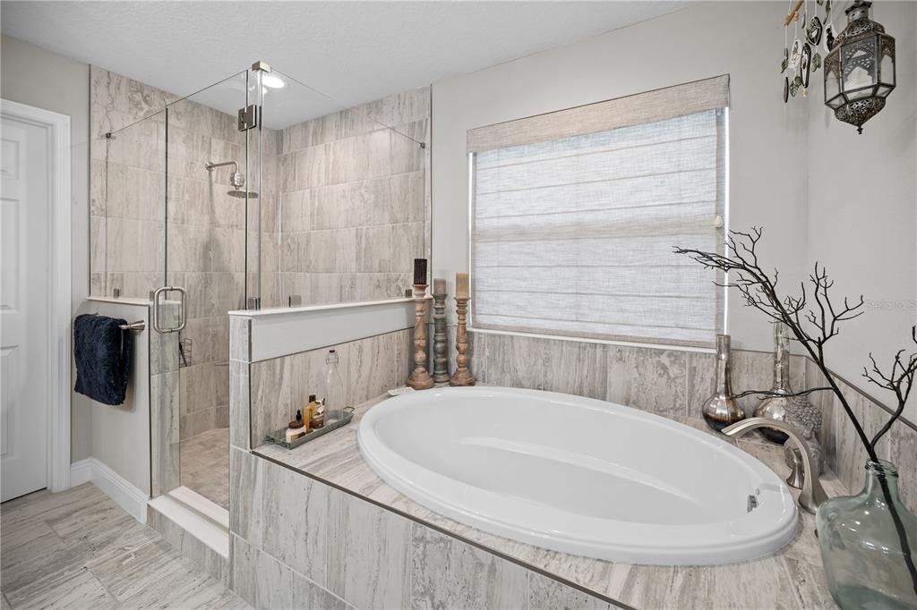 14734 Horse Trot Road Lithia, FL 33547 - Photo 37 of 66 a bathroom with a sink a toilet and shower