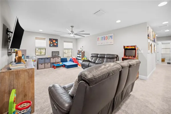 a bathroom with a shower curtain and a sink