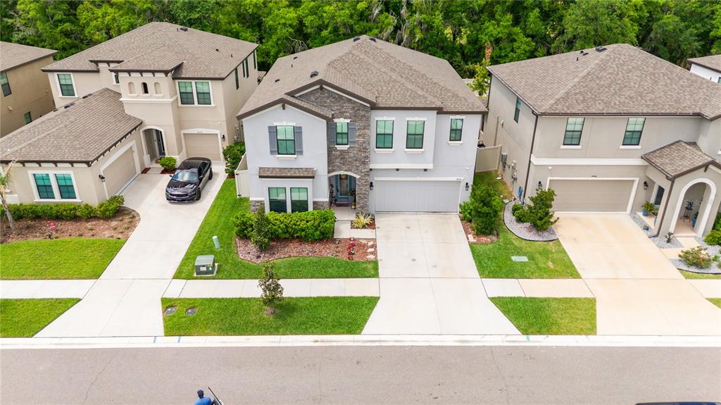 14734 Horse Trot Road Lithia, FL 33547 - Photo 53 of 66 a front view of a house with a yard