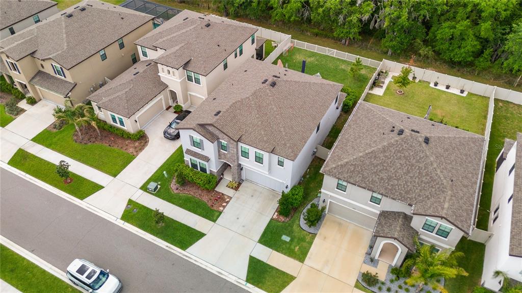 14734 Horse Trot Road Lithia, FL 33547 - Photo 56 of 66 an aerial view of a house with a garden and mountain view