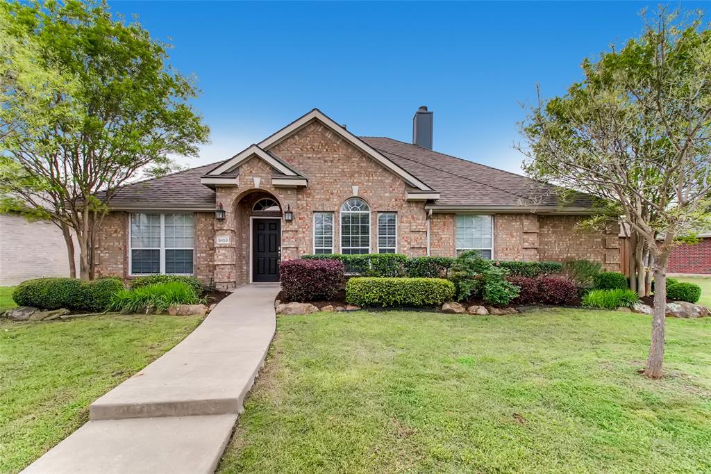3853 Cherry Ridge Drive Frisco, TX 75033 - Photo 1 of 1 a front view of a house with a yard