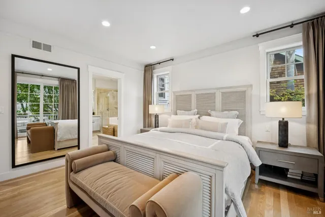 a view of a balcony with furniture