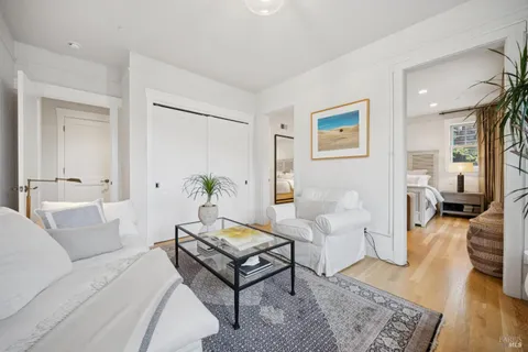 a bathroom with a sink a mirror and a shower