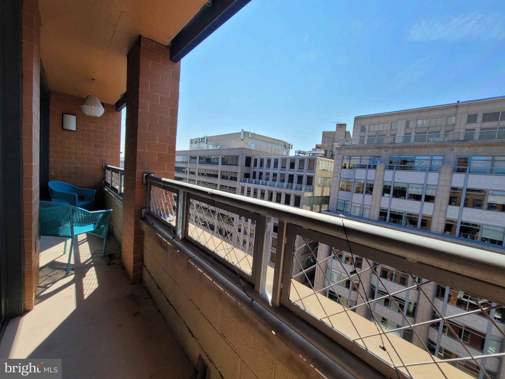 a view of a balcony with city view
