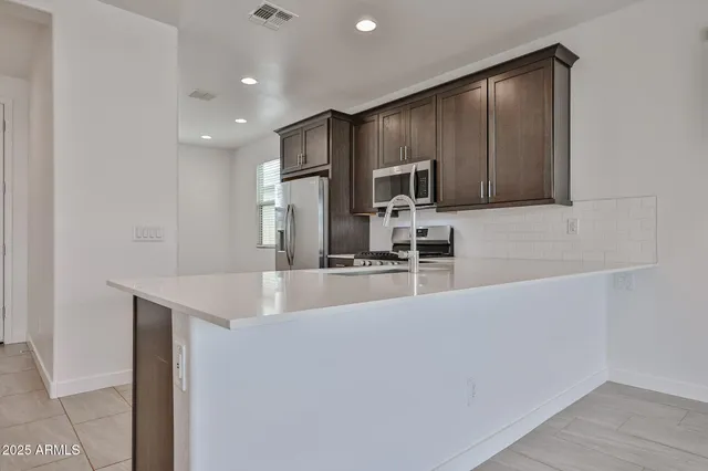 $1,895 | 16828 West Evergreen Road, Waddell, AZ 85355