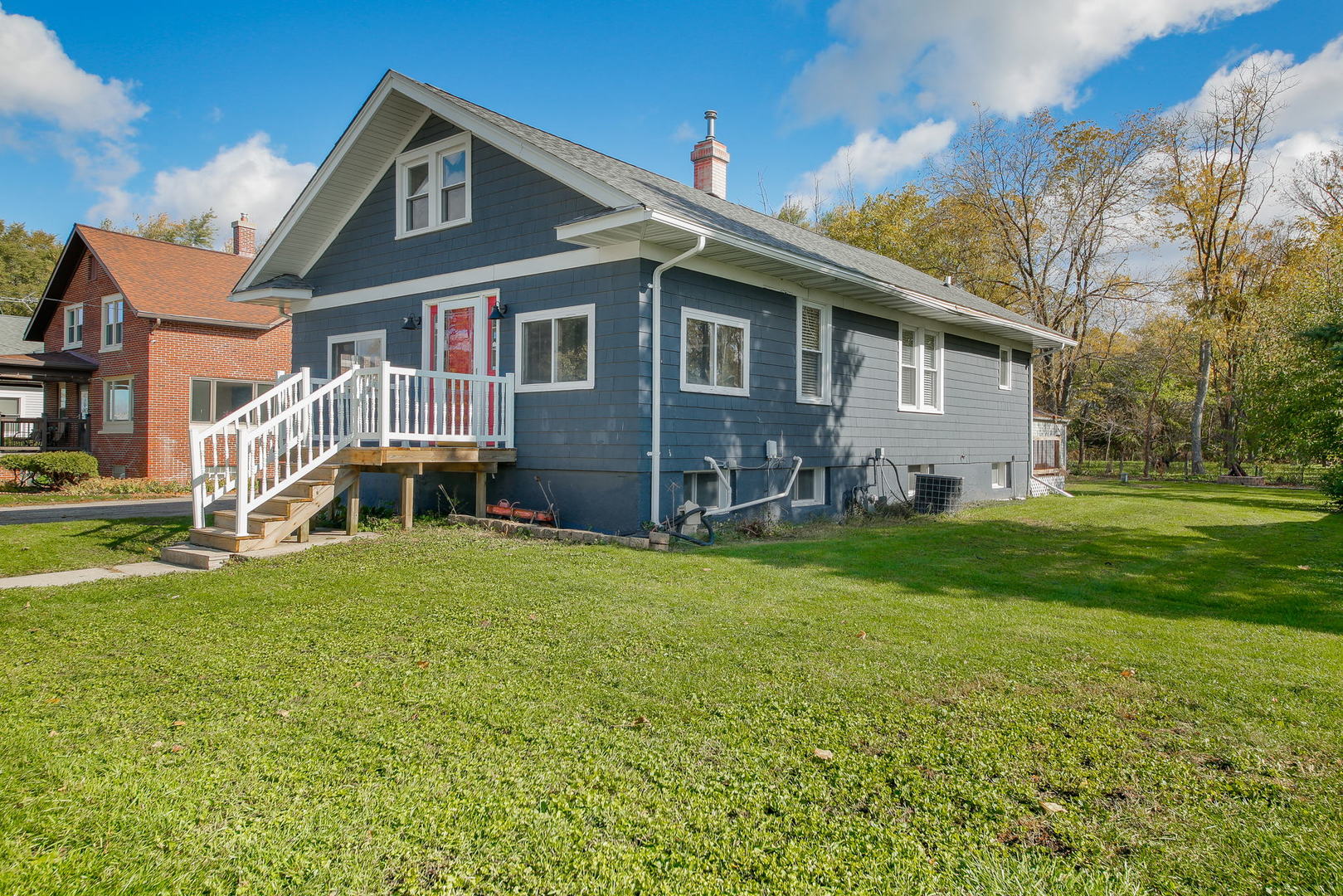 10N835 Rippburger Road Elgin, IL 60124 - Photo 2 of 20 a front view of a house with a yard