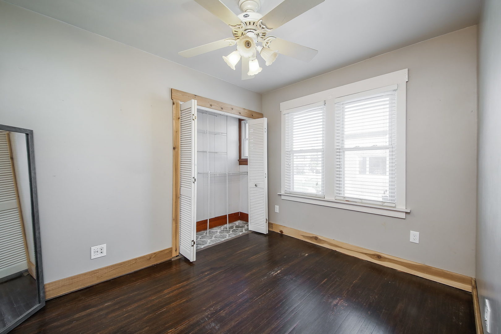10N835 Rippburger Road Elgin, IL 60124 - Photo 12 of 20 an empty room with wooden floor and windows