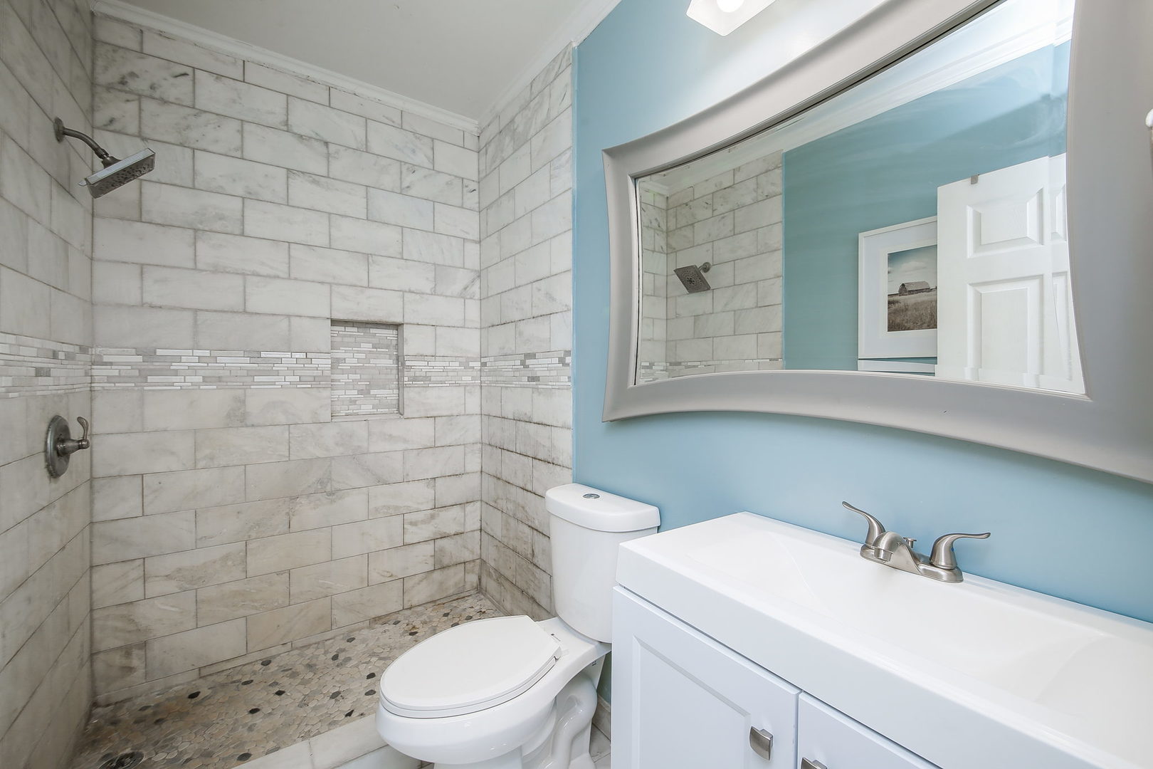 10N835 Rippburger Road Elgin, IL 60124 - Photo 13 of 20 a bathroom with a sink a toilet and shower