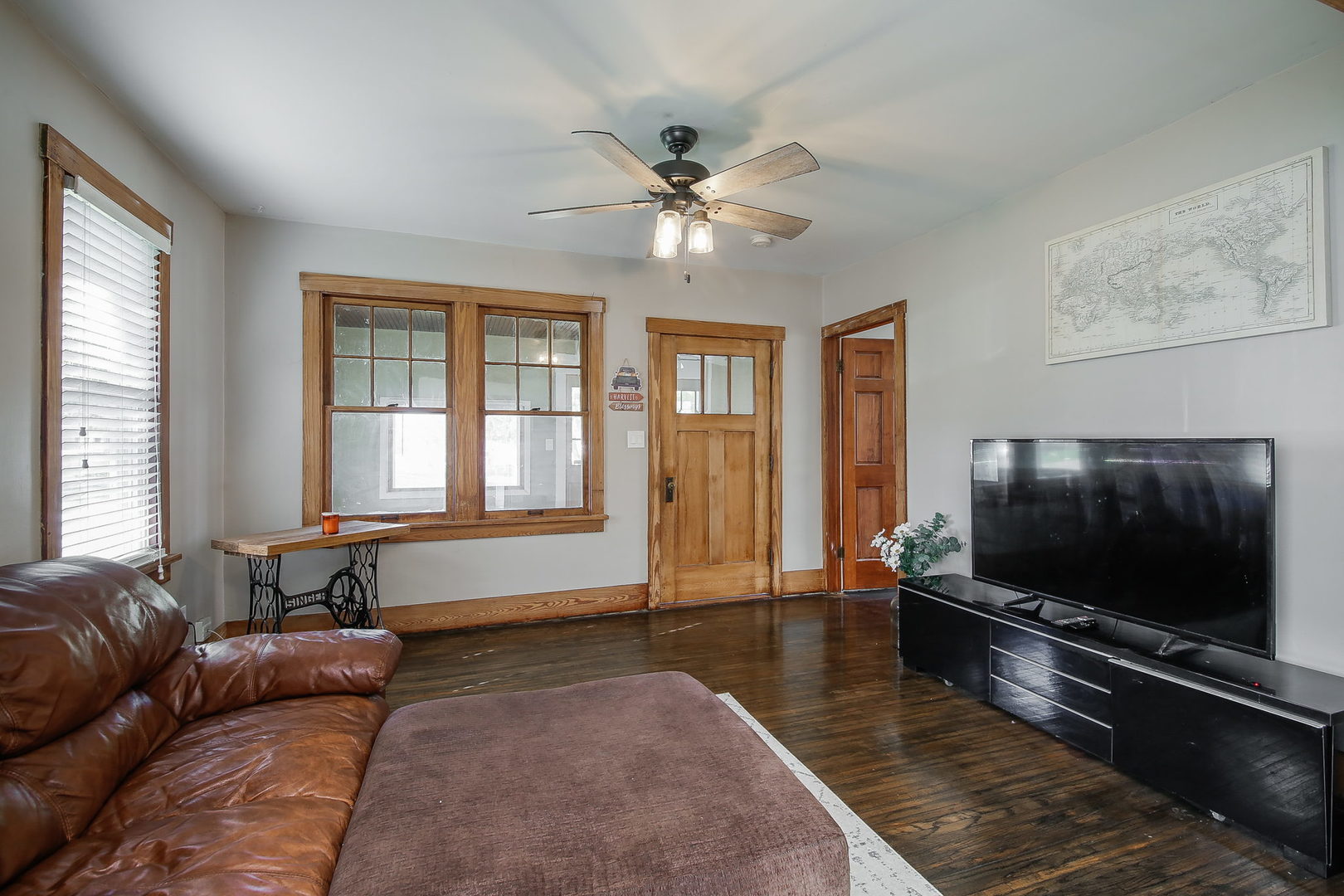 10N835 Rippburger Road Elgin, IL 60124 - Photo 5 of 20 a living room with furniture and a flat screen tv