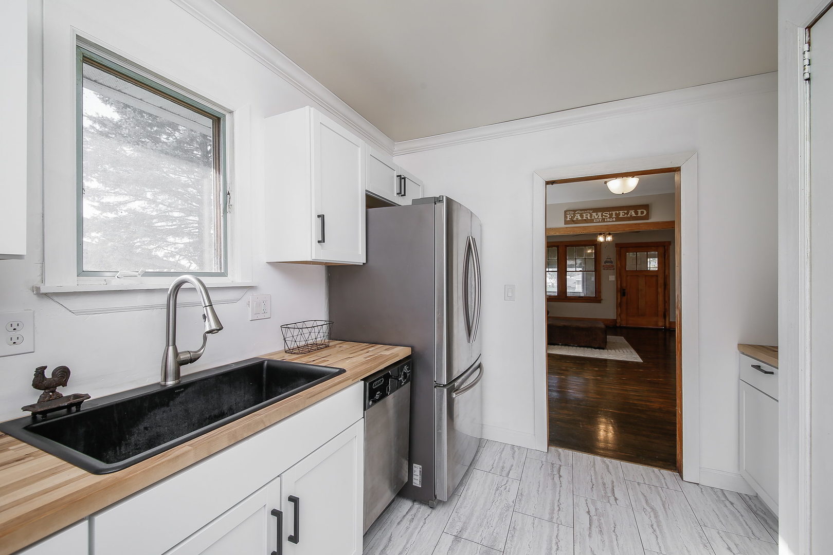 10N835 Rippburger Road Elgin, IL 60124 - Photo 8 of 20 a kitchen with a refrigerator and a sink