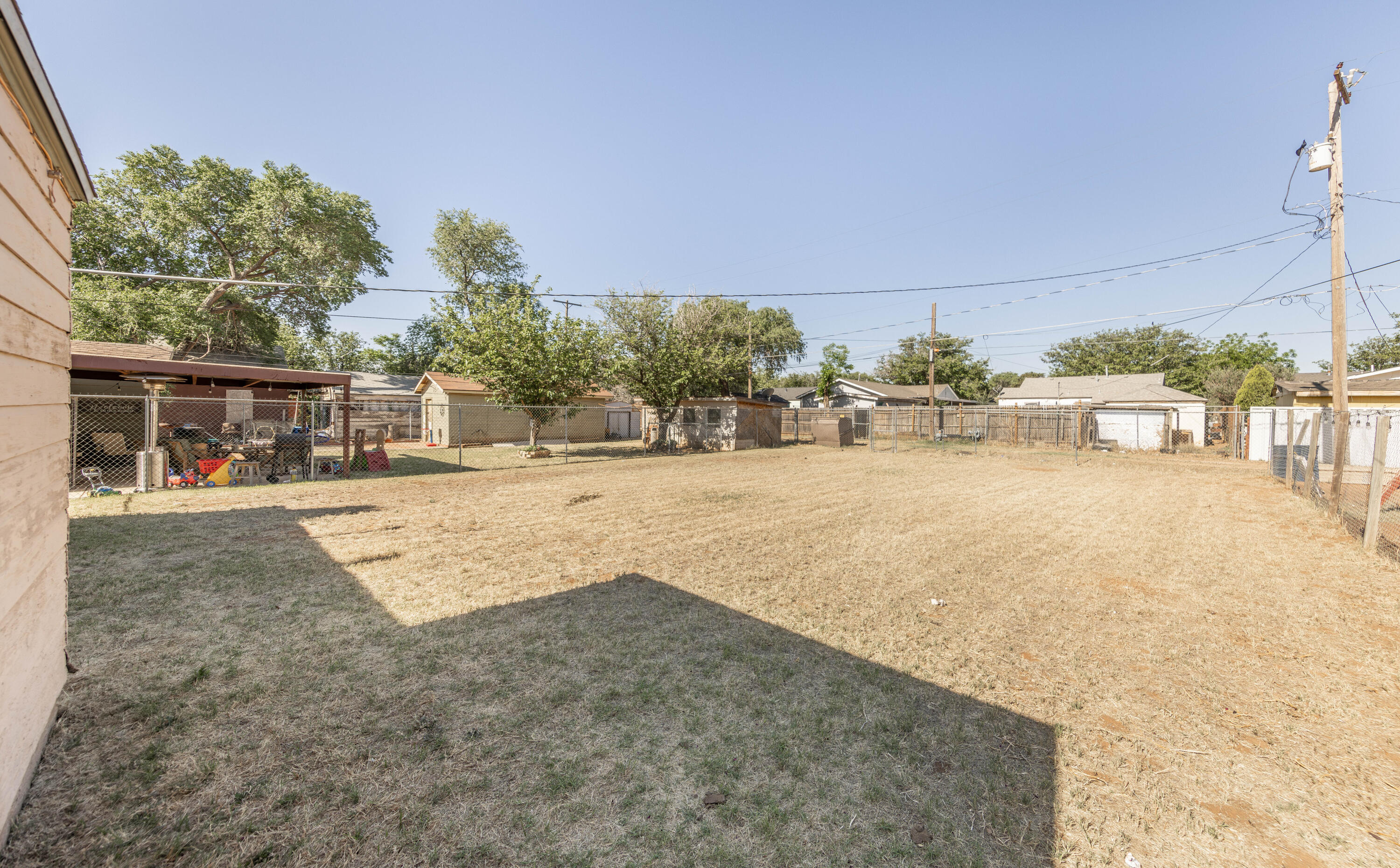 110 Uvalde Avenue Lubbock, TX 79415 - Photo 11 of 15 a view of swimming pool with a patio
