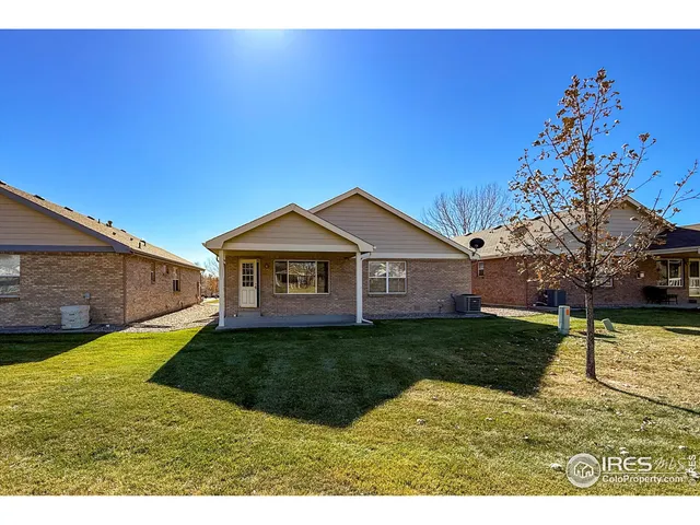 a view of a yard in front of a house with a yard