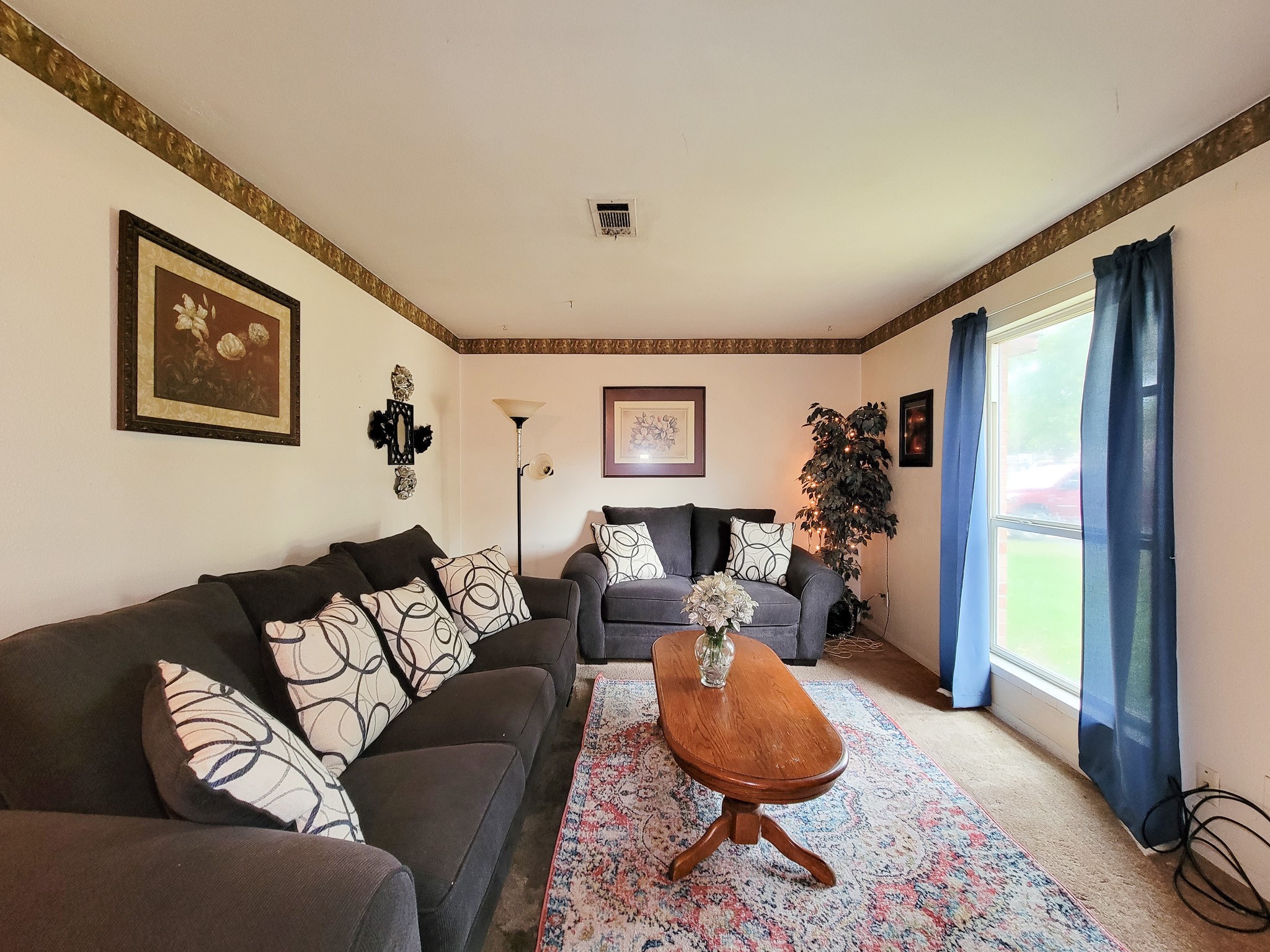 1330 Mosher Lane Houston, TX 77088 - Photo 3 of 16 a living room with furniture and a rug