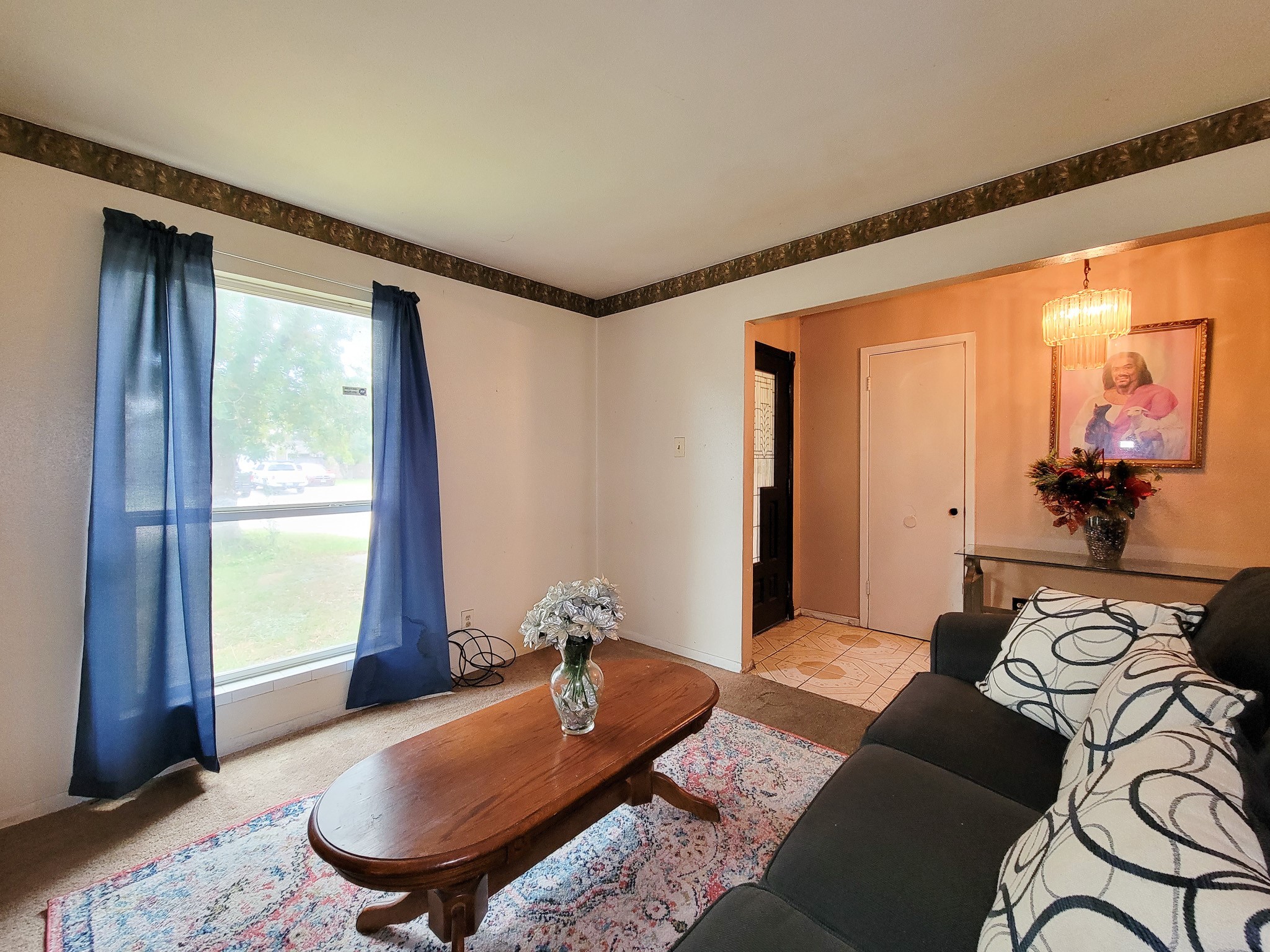 1330 Mosher Lane Houston, TX 77088 - Photo 4 of 16 a living room with furniture and a window