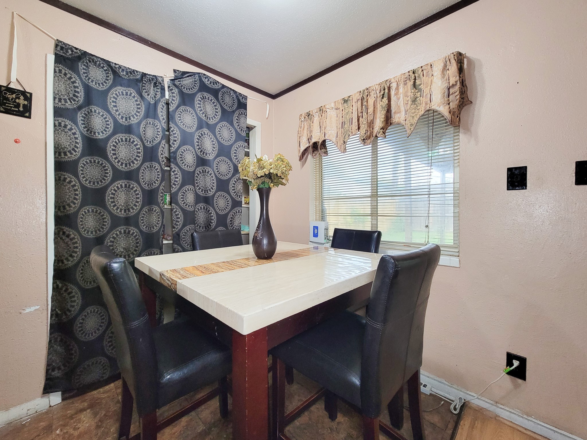 1330 Mosher Lane Houston, TX 77088 - Photo 10 of 16 a view of a dining room with furniture and wooden floor
