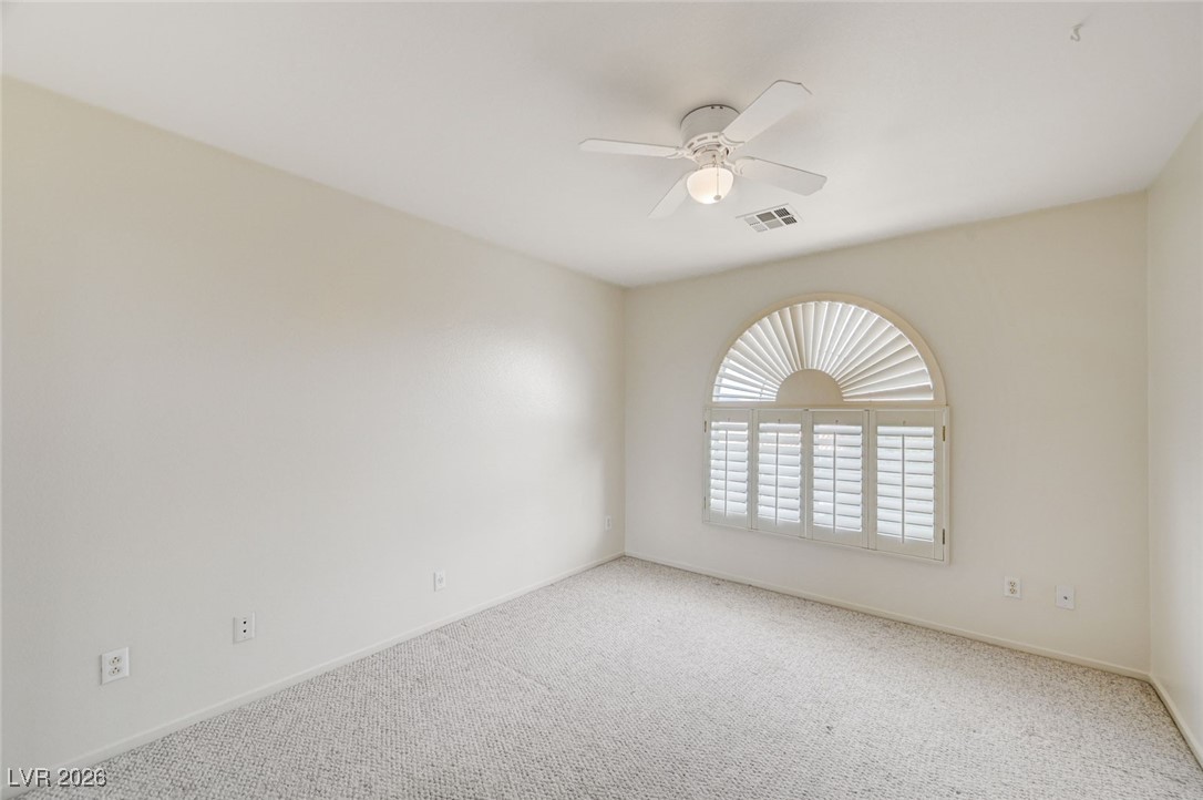 3901 Triora Street Las Vegas, NV 89129 - Photo 30 of 42 Spare room featuring carpet floors and ceiling fan